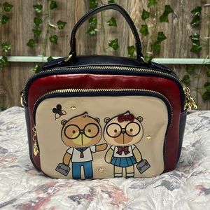 I am selling a cream bear satchel